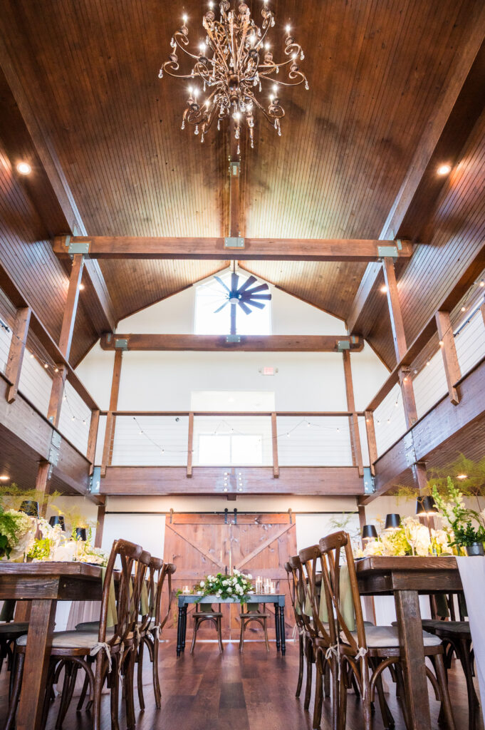 Rustic yet elegant wedding reception inside Halcyon Watson barn in Loudoun County, Virginia.