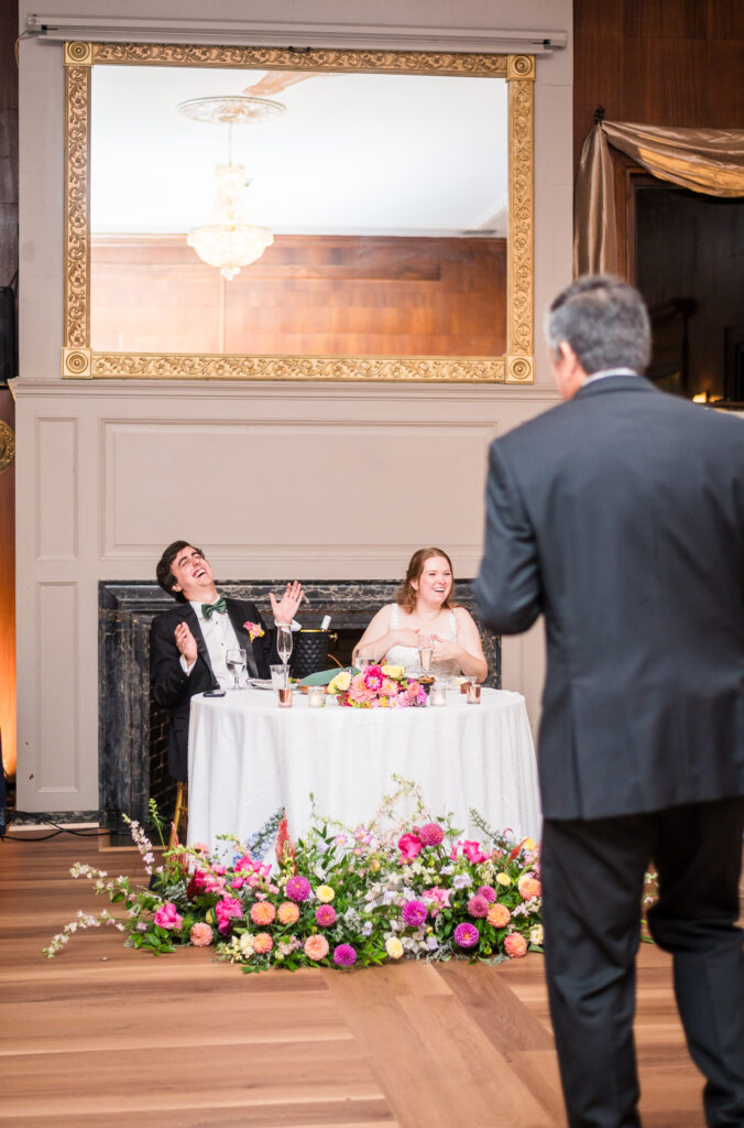 Candid wedding photo of a couple laughing, captured naturally by a DMV wedding photographer.