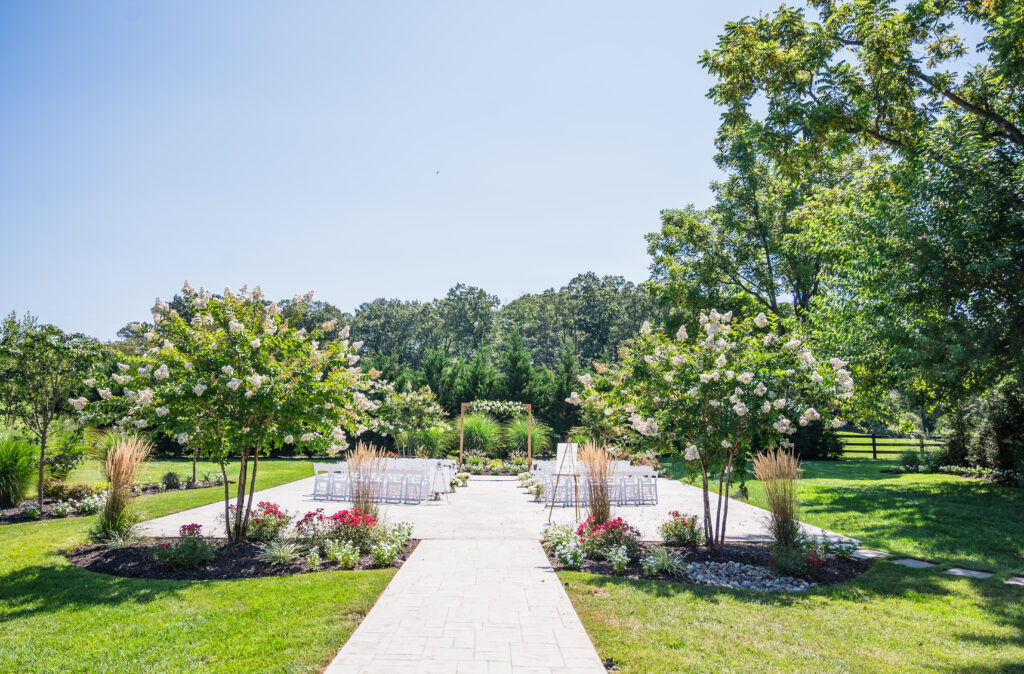 Intimate outdoor wedding ceremony on the 2,200 sq. ft. patio at Halcyon Watson in Loudoun County, VA.