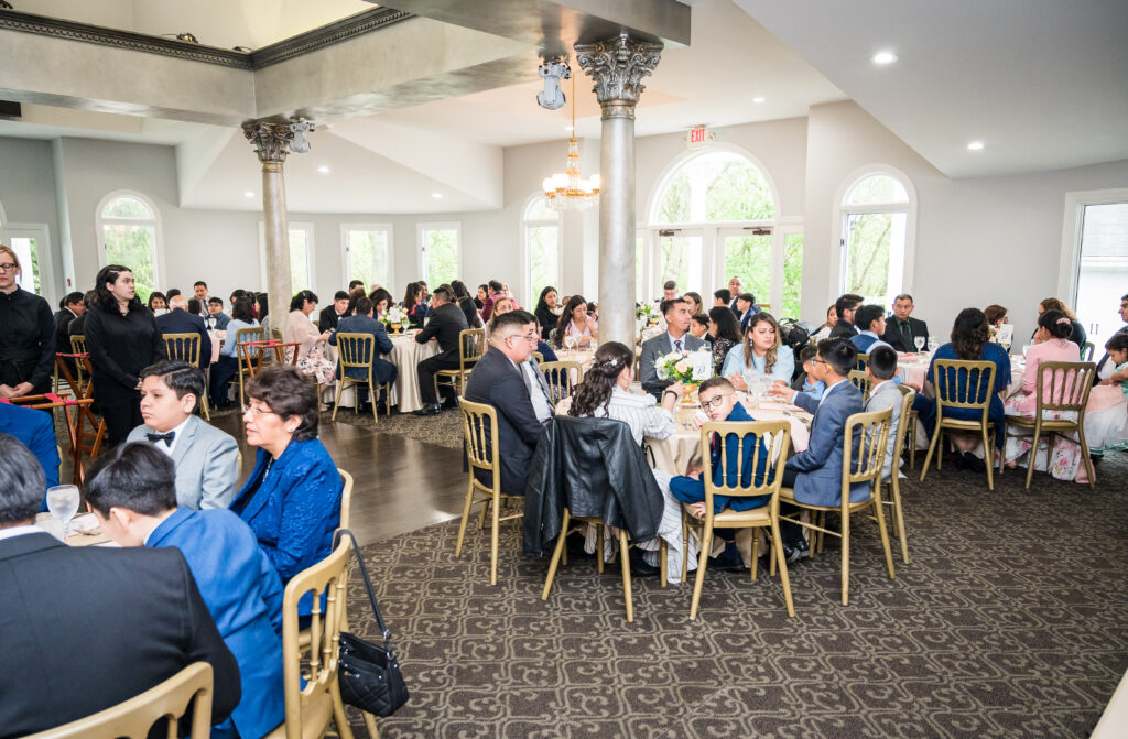 Grand Ballroom at Ceresville Mansion featuring chandeliers, tall ceilings, and elegant gold accents for wedding receptions.