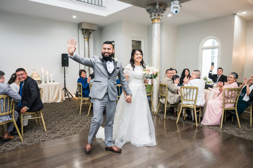 Grand Ballroom at Ceresville Mansion featuring chandeliers, tall ceilings, and elegant gold accents for wedding receptions.
