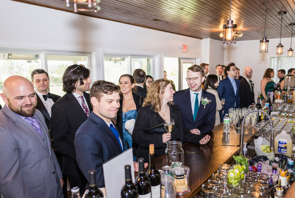 Guests enjoying a Northern Virginia barn wedding cocktail hour at Halcyon Watson.
