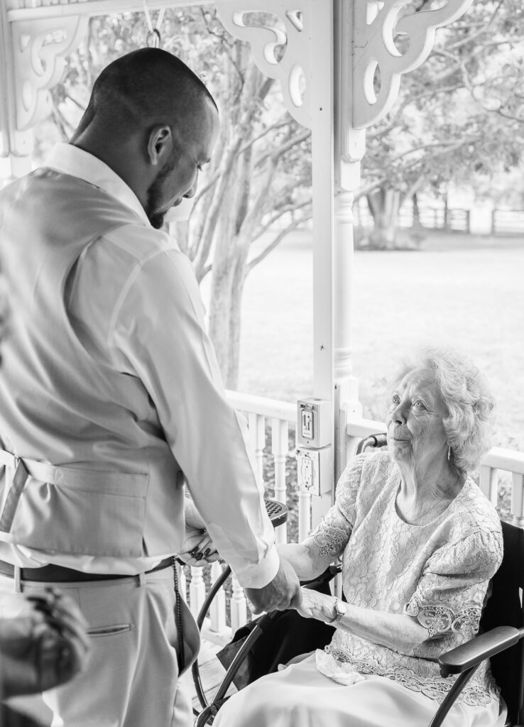 Couple embracing on their wedding day, showcasing a joyful photography experience with their Maryland wedding photographer.