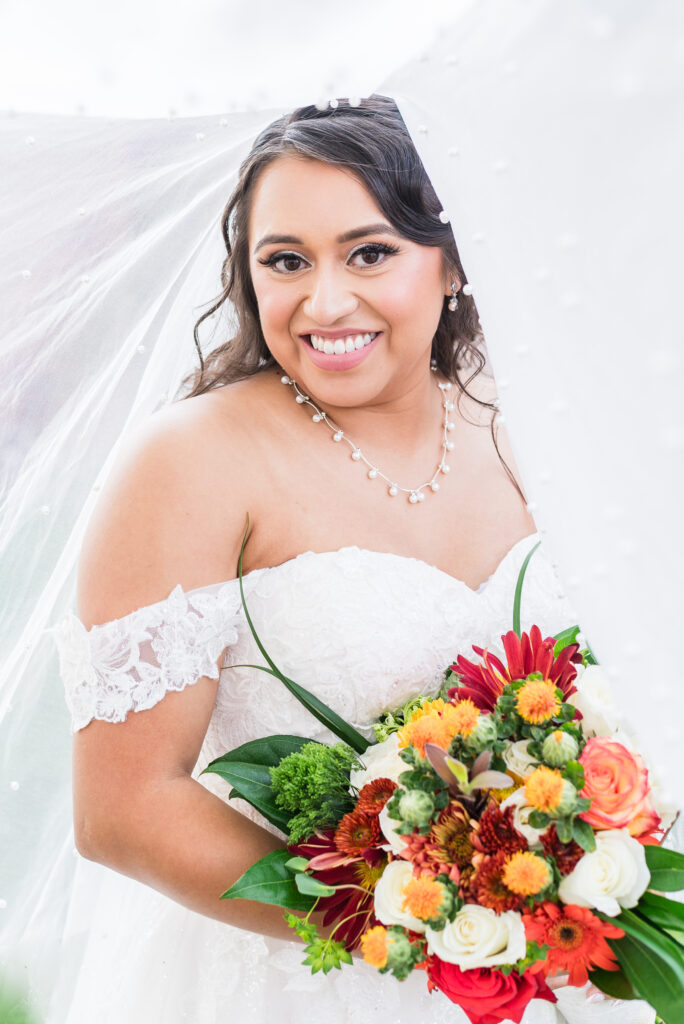 Romantic off-the-shoulder neckline on bridal gown