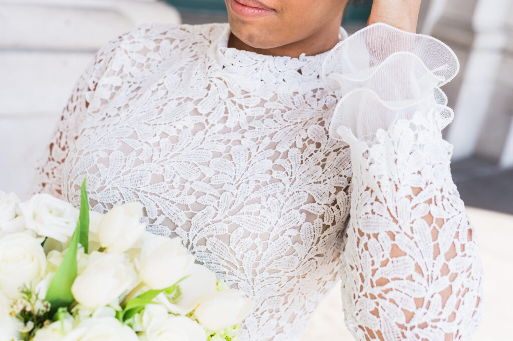 Wedding dress details that photograph well - bride wearing statement sleeves