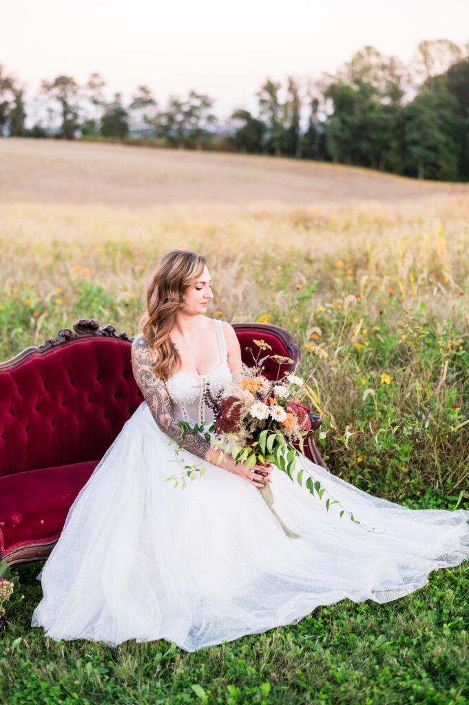 Bride in a photogenic wedding dress with intricate lace and elegant sleeves, perfect for bridal photos