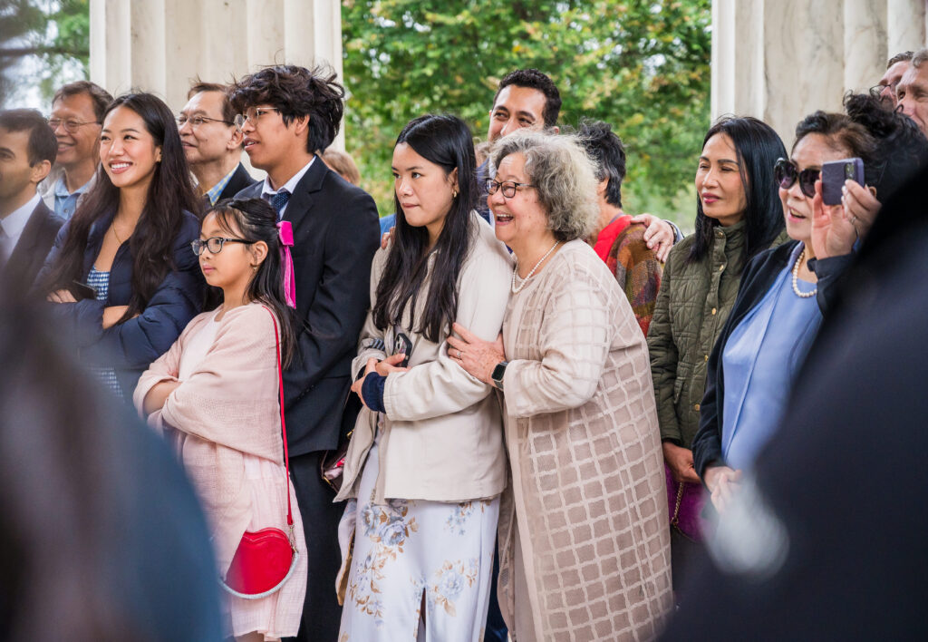 Mom of the bride witnessing her daughter get married at the D.C. War Memorial.