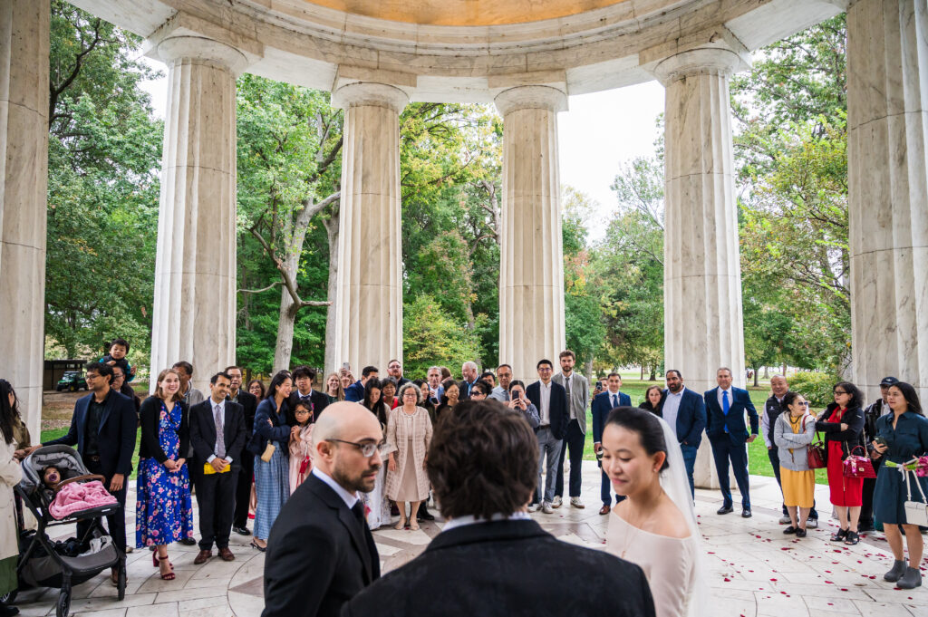 Guest during wedding ceremony at the D.C. War Memorial
