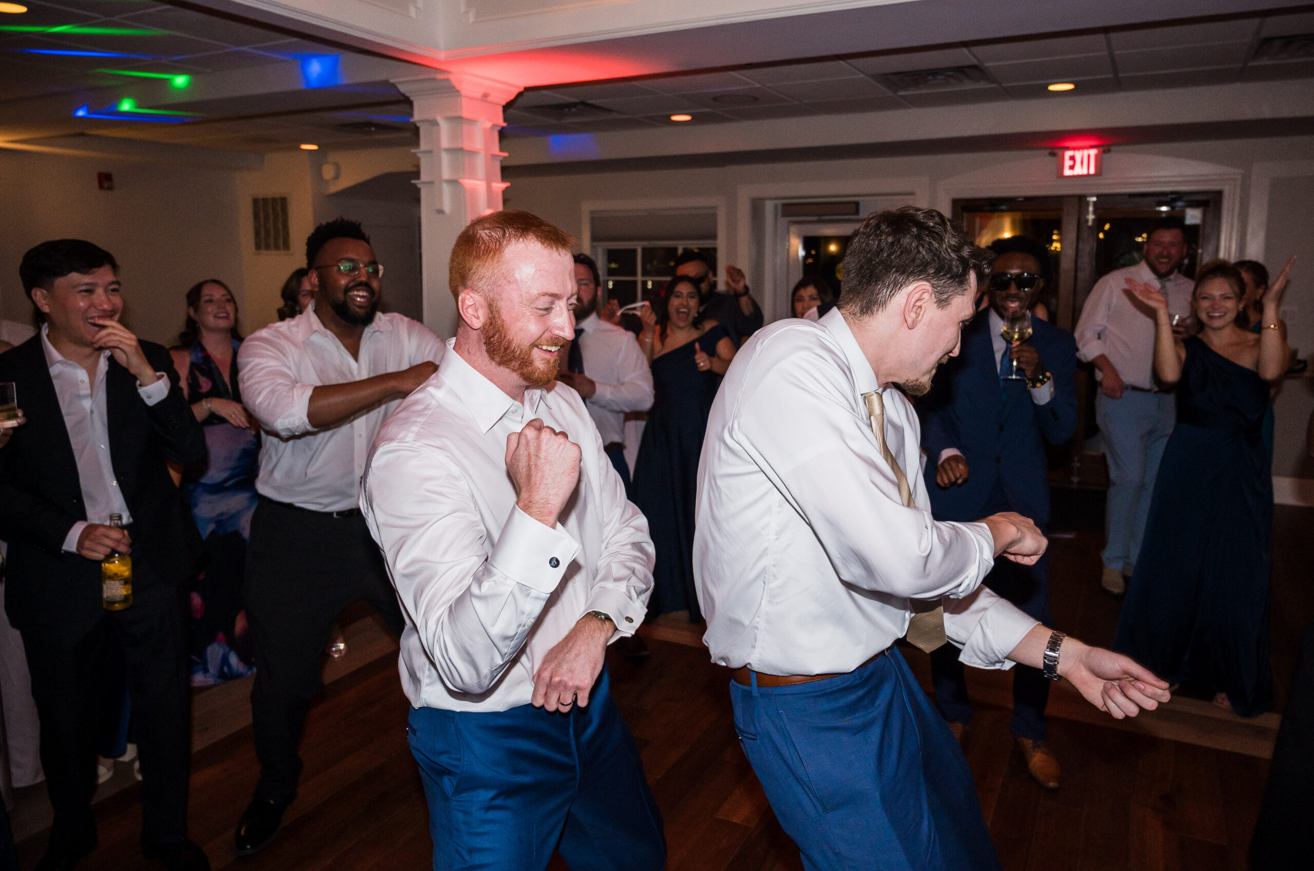 Groom dancing at wedding reception at Herrington on the Bay in North Beach Maryland