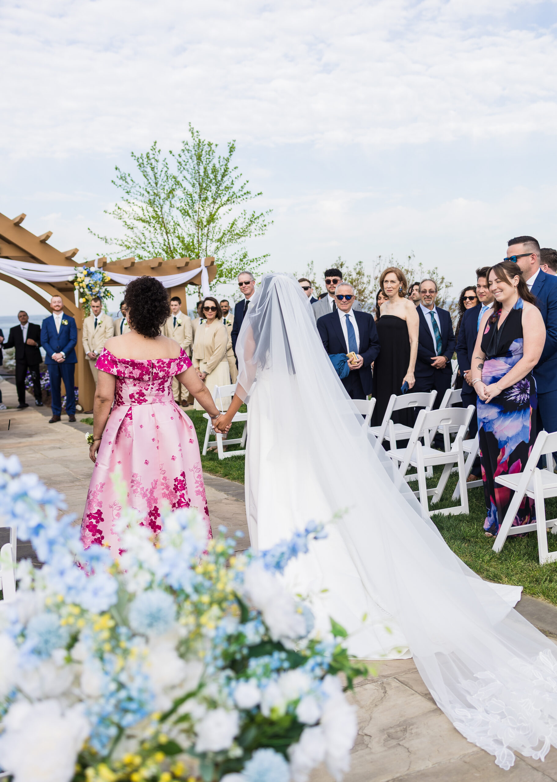 Outdoor wedding ceremony overlooking the water at Herrington on the Bay