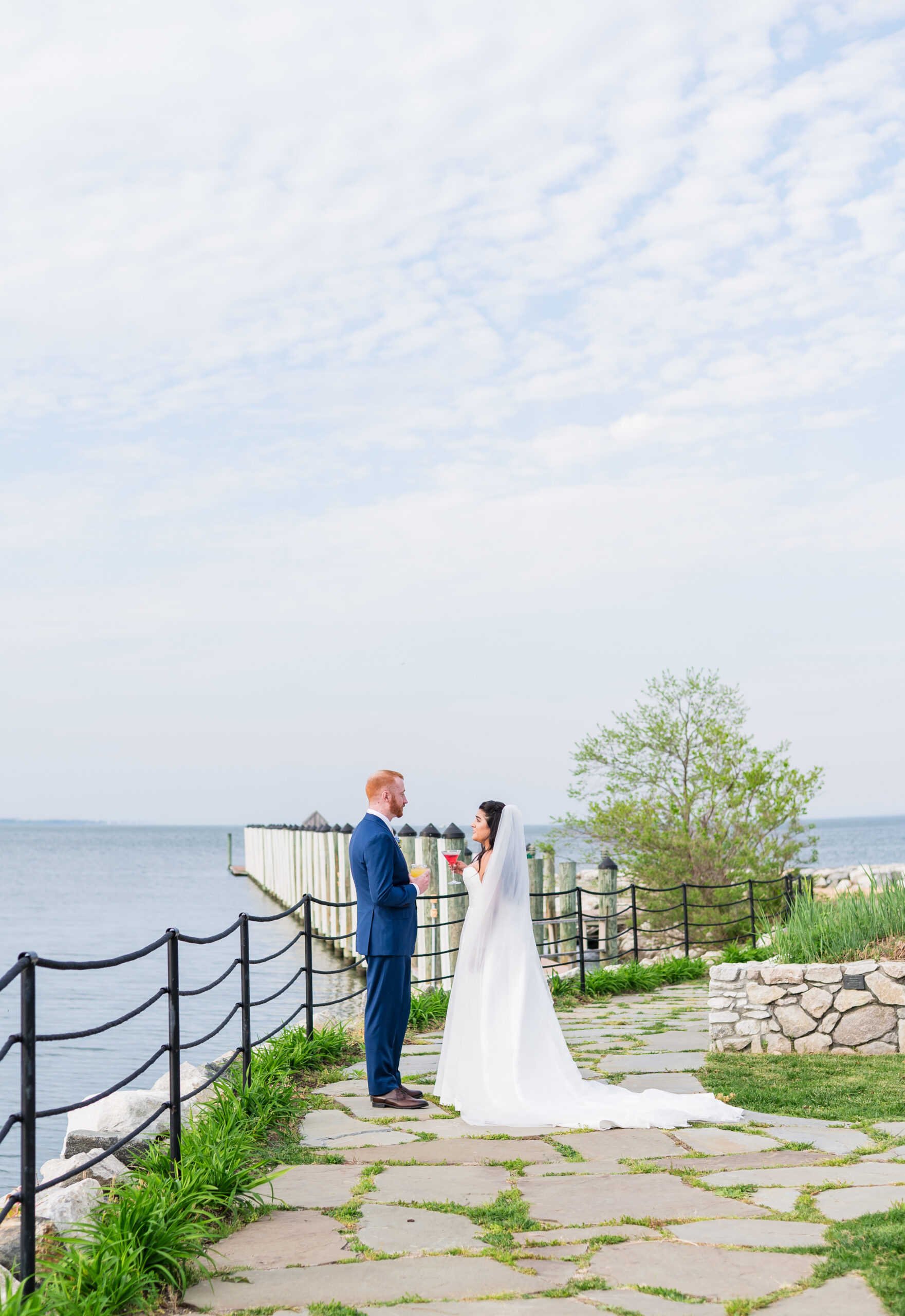 Wedding portraits by the water at Herrington on the Bay in Maryland