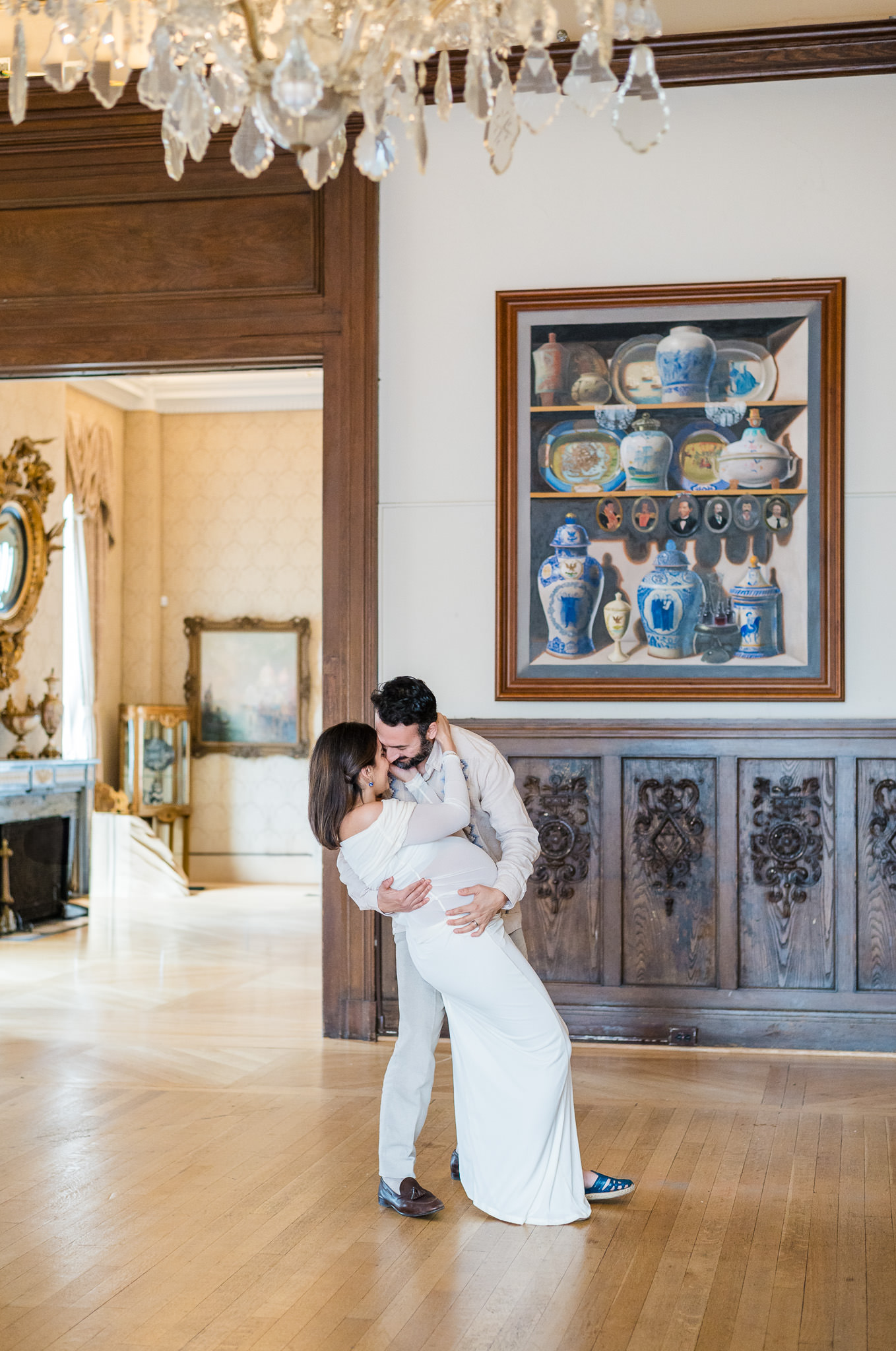 Timeless maternity portrait of expecting parents during a maternity session at the Mexican Cultural Institute.