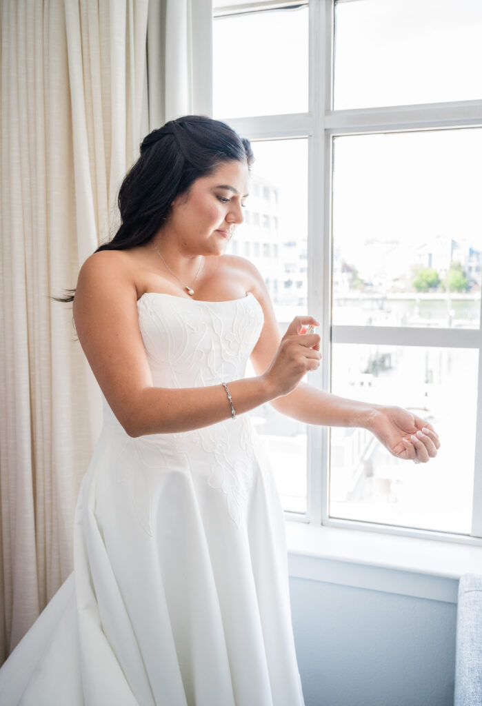 Bride final touches in getting ready room at Rod N Reel Resort