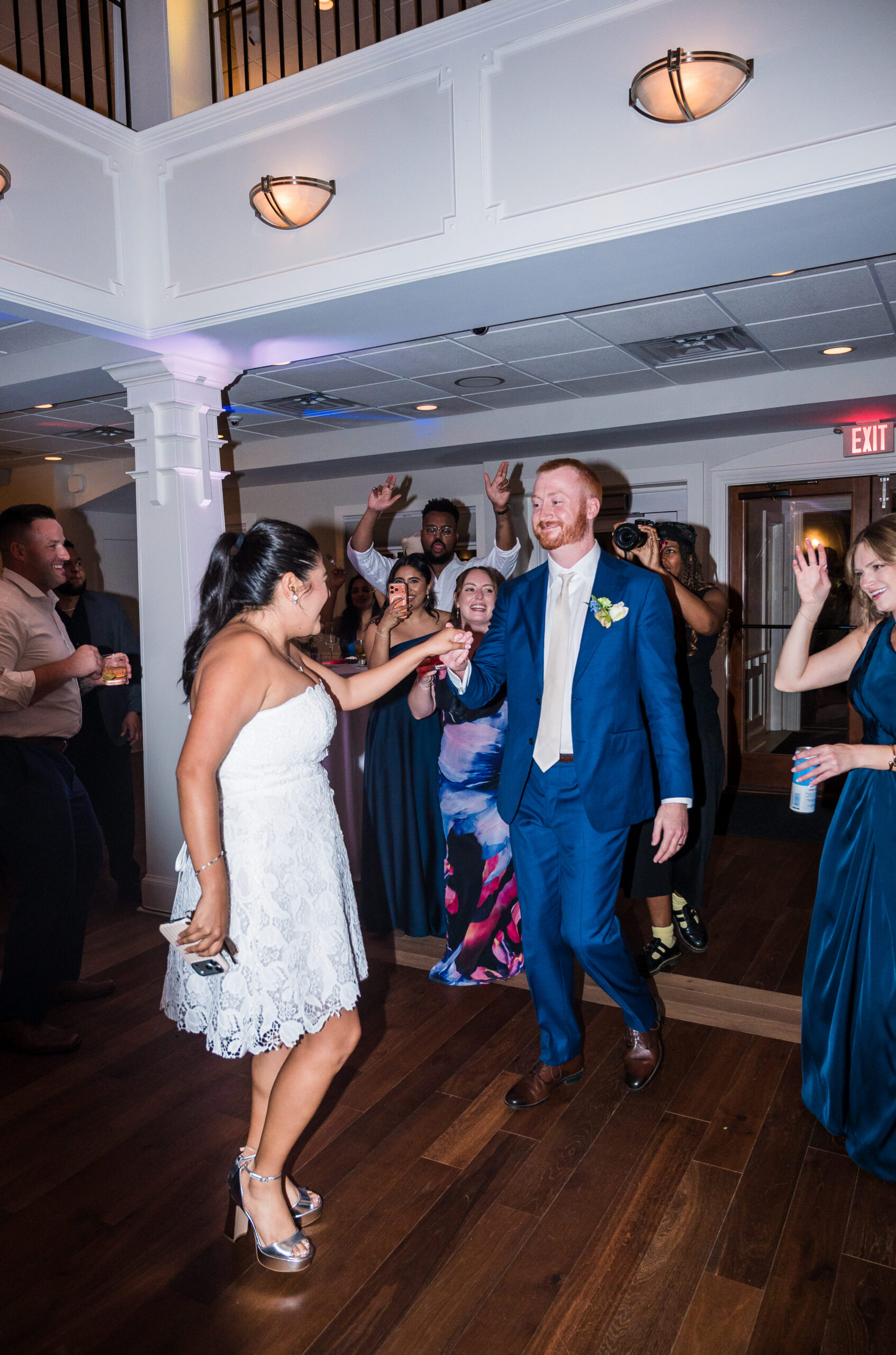 Bride and groom dancing at wedding reception captured at Herrington on the Bay in North Beach Maryland